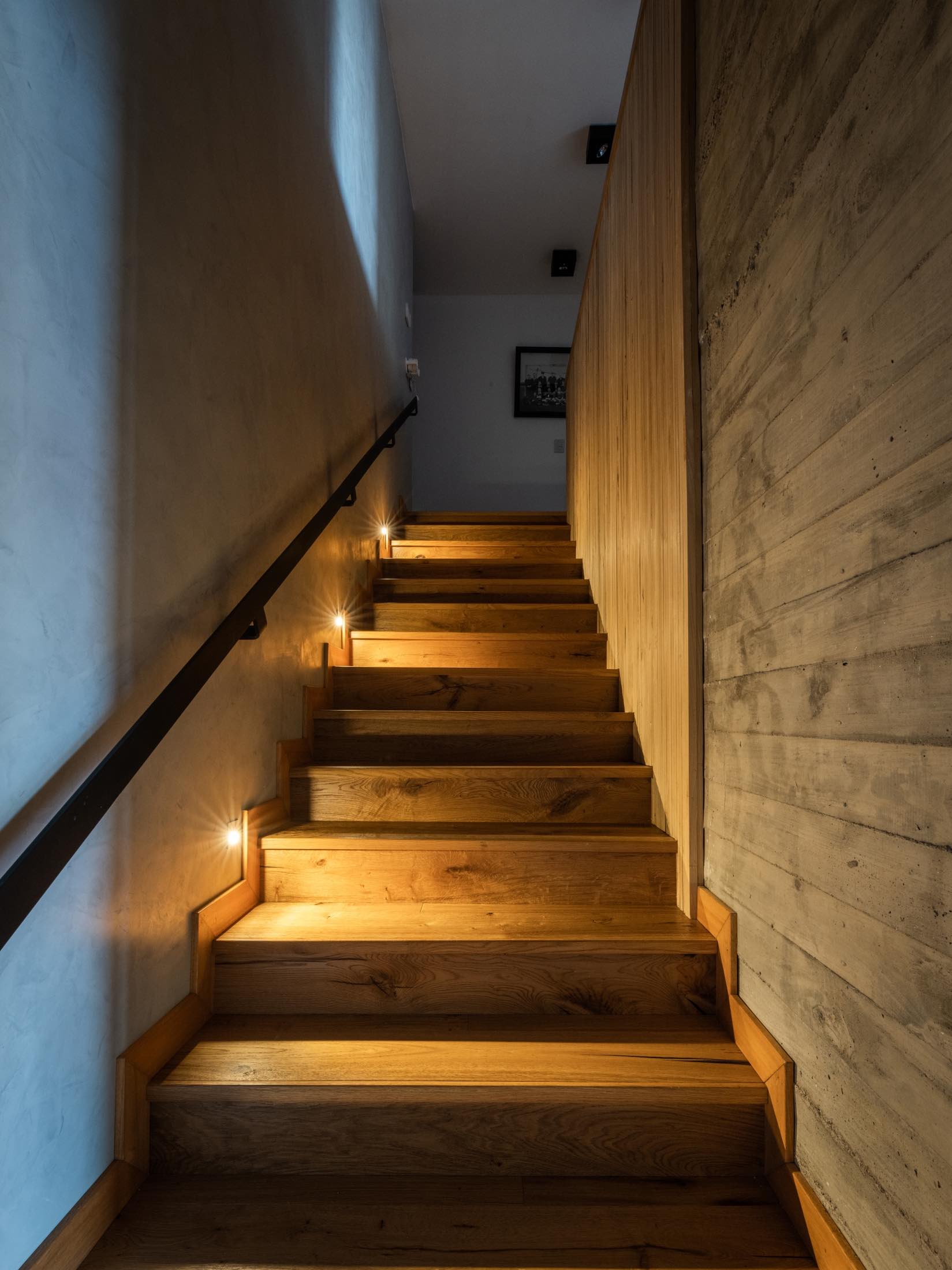 staircase with lighting